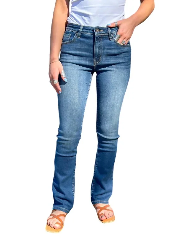 High Rise Bootcut Jeans In Medium Rinse Fashionable Frayed Hem Denim